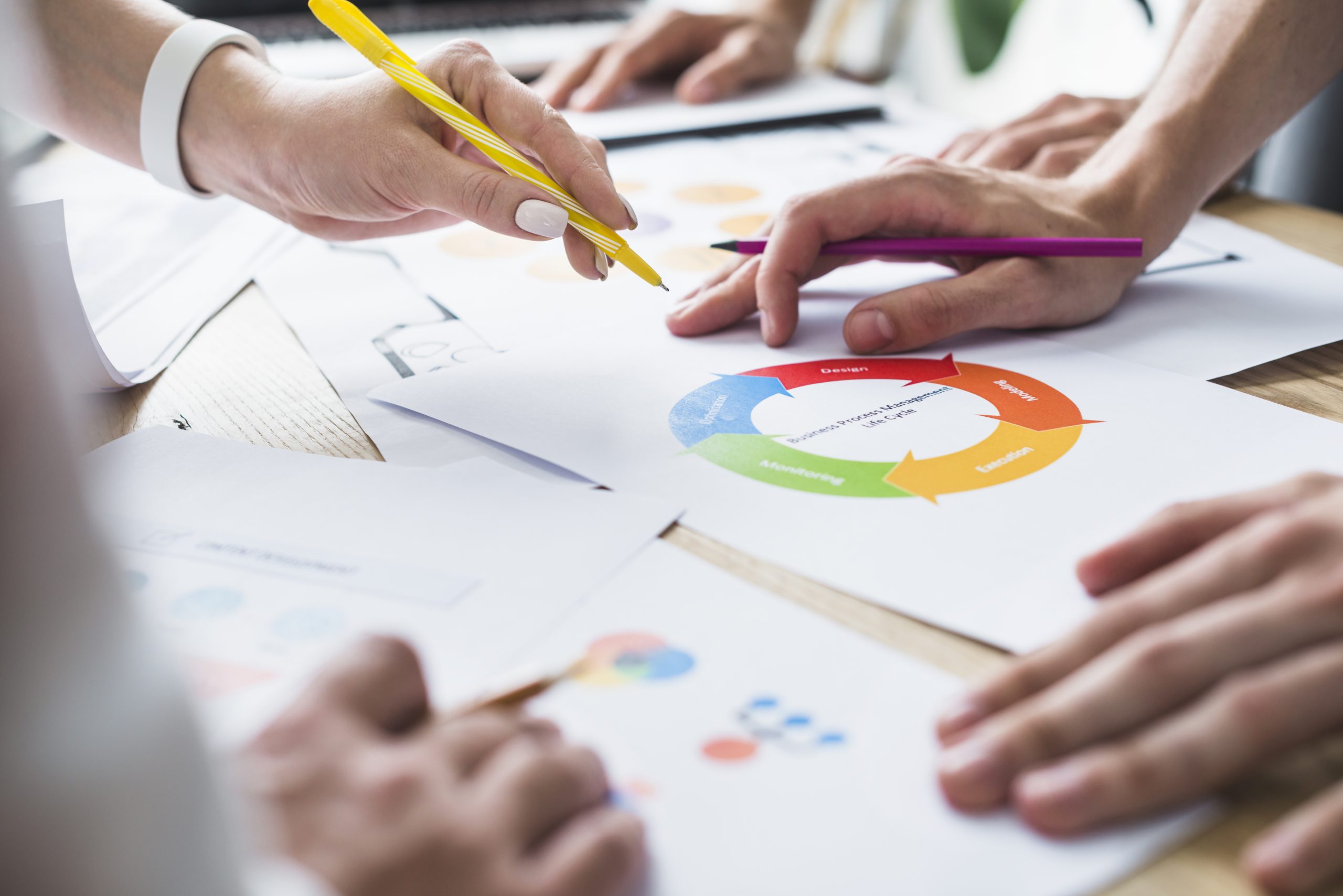 group-businesspeople-analyzing-graph